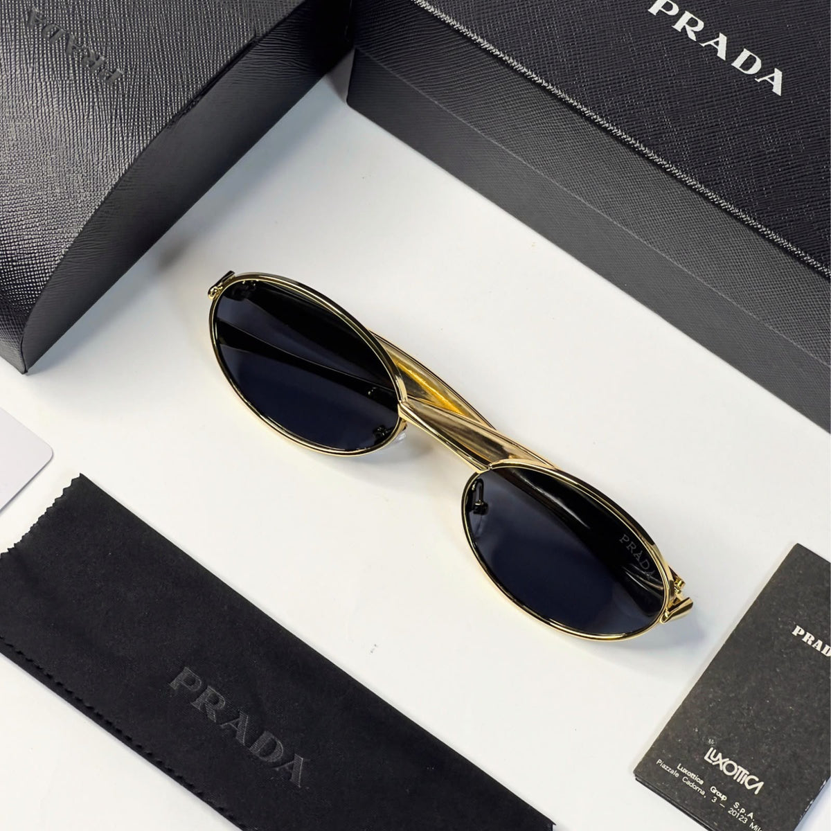 Pra_da gold & black sunglasses