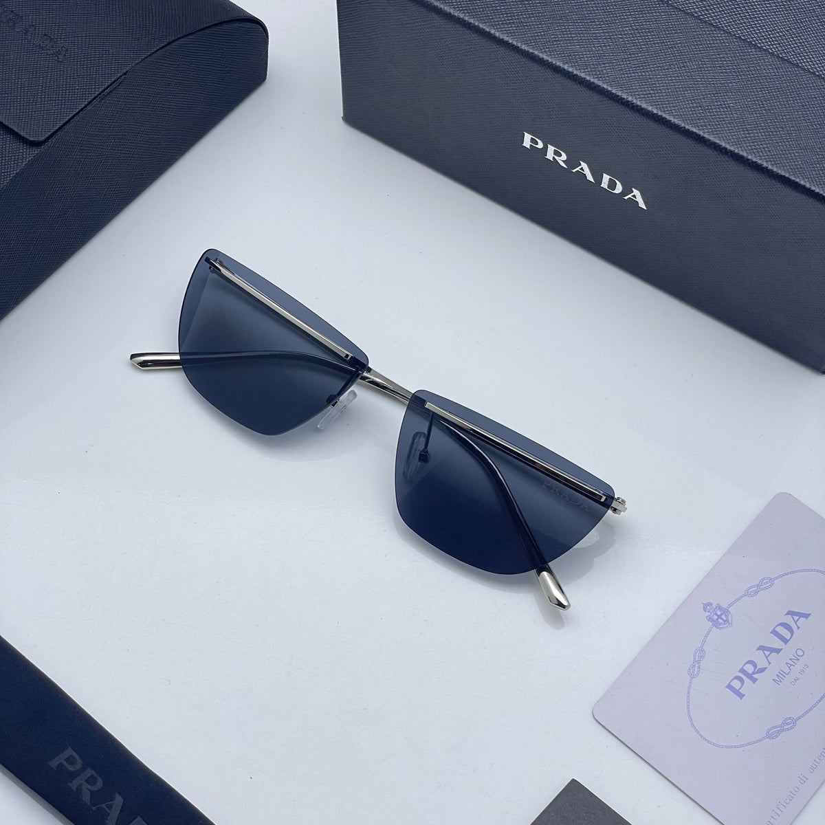 Pra_da black shaded golden sunglasses with original box kit