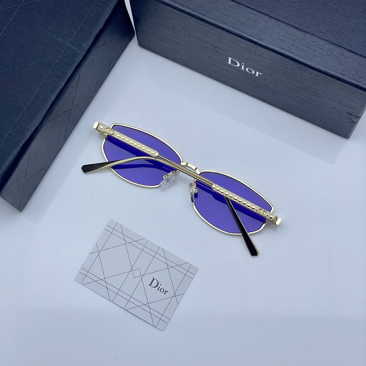 Di_or purple shaded silver sunglasses with original box kit