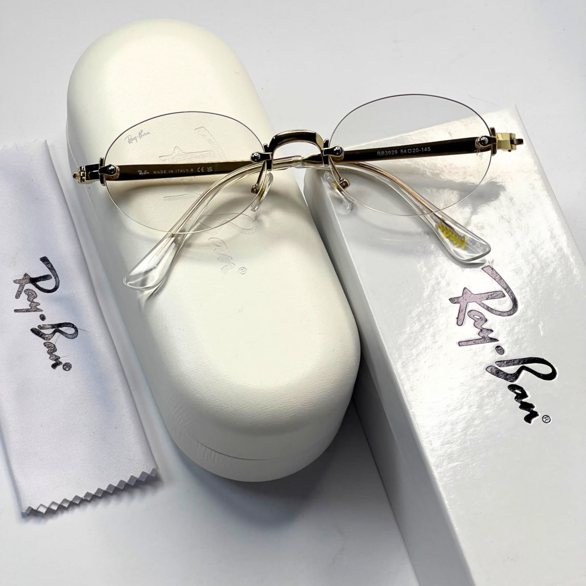 Ray_ban oval gold plano for unisex