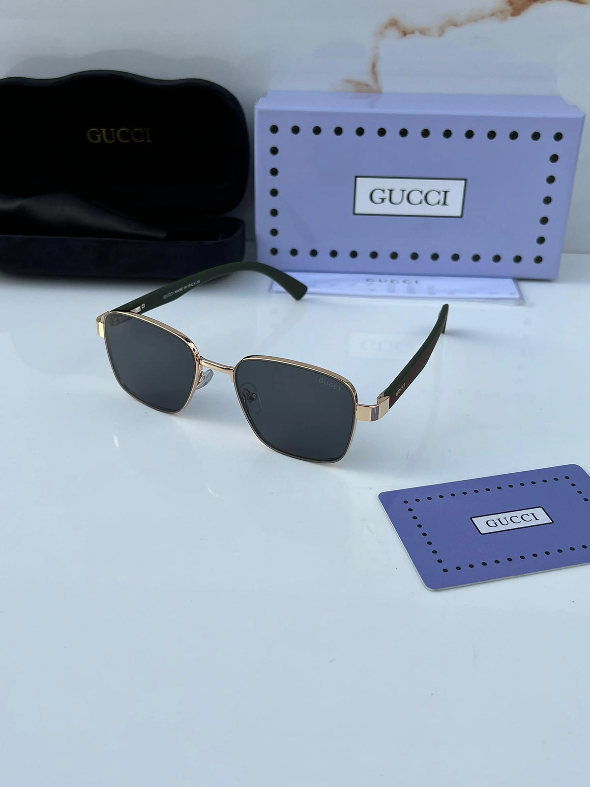Gu_cci black gold edition sunglasses