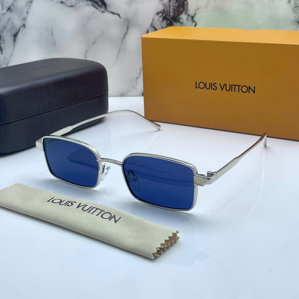 Lou_is vui_tton blue shaded silver with original box kit