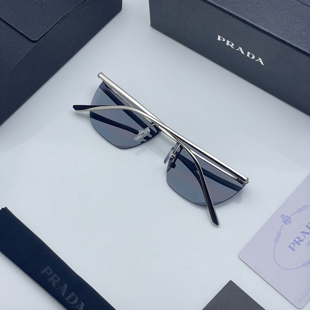 Pra_da black shaded golden sunglasses with original box kit