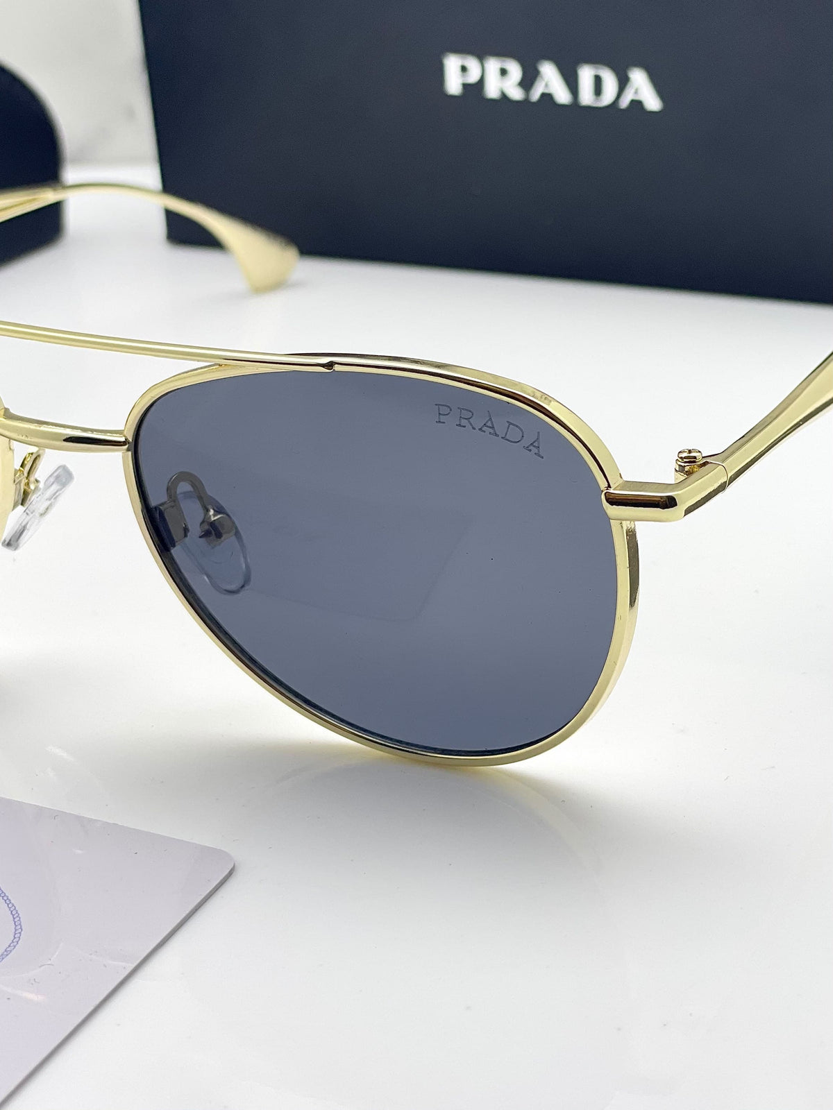 Pra_da black and gold sunglasses for men