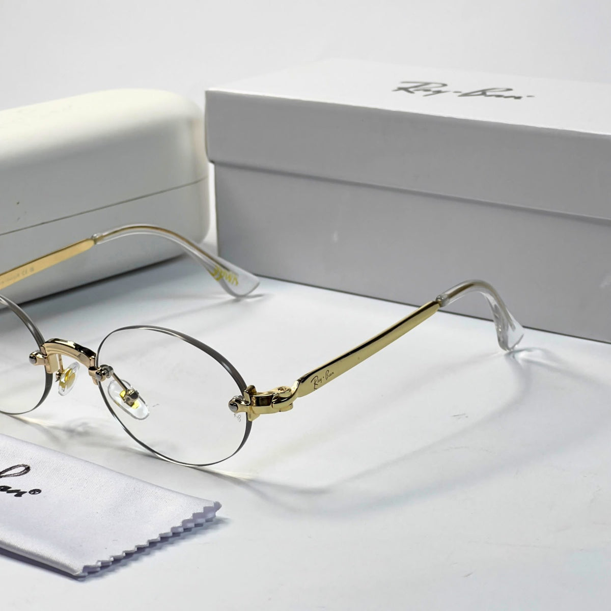 Ray_ban oval gold plano for unisex
