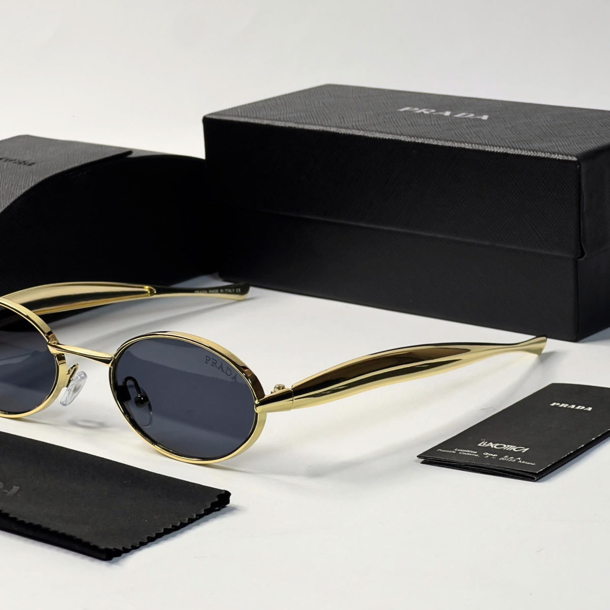 Pra_da gold & black sunglasses