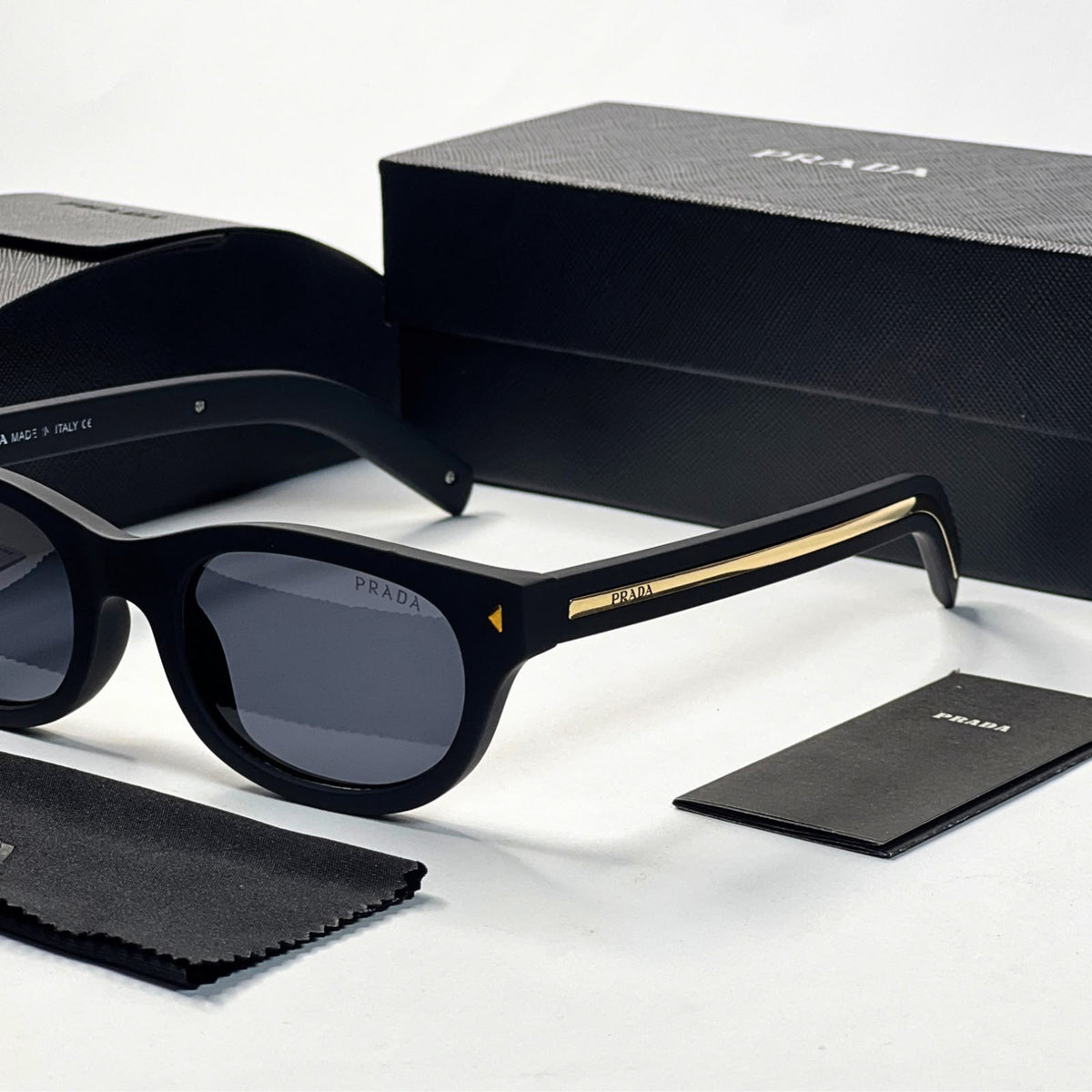 Pra_da matt black gold line sunglasses