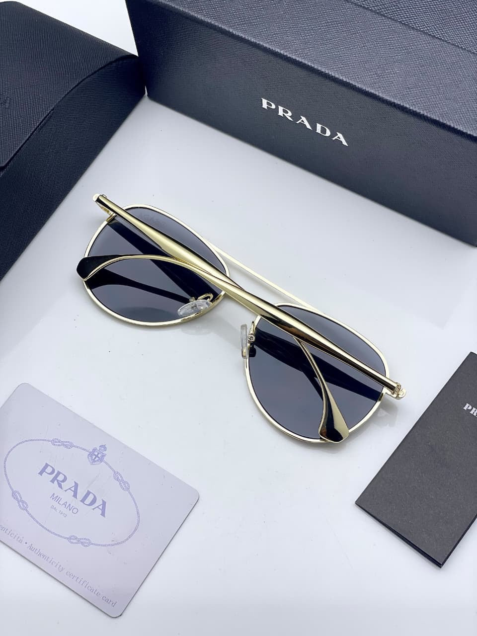 Pra_da black and gold sunglasses for men