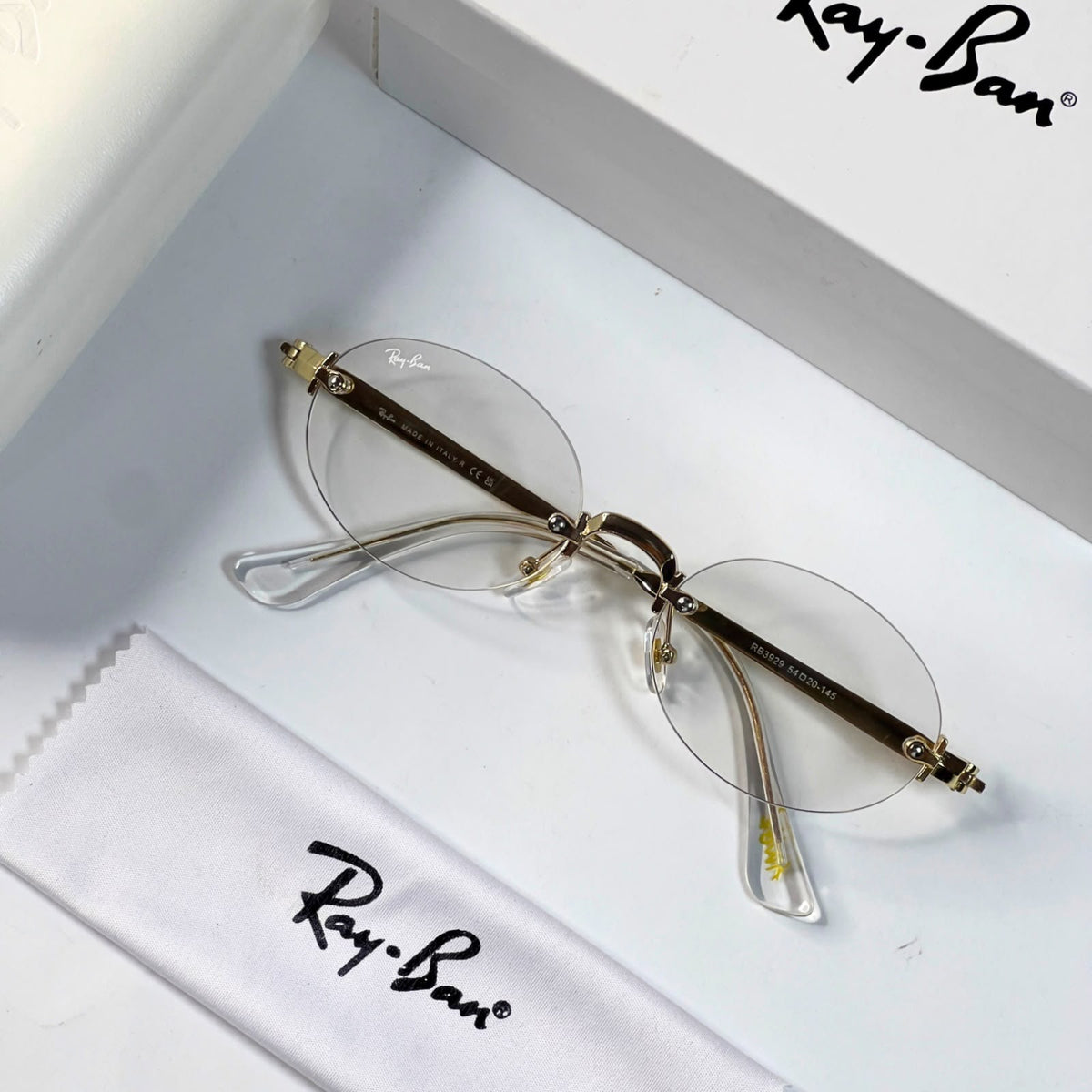Ray_ban oval gold plano for unisex