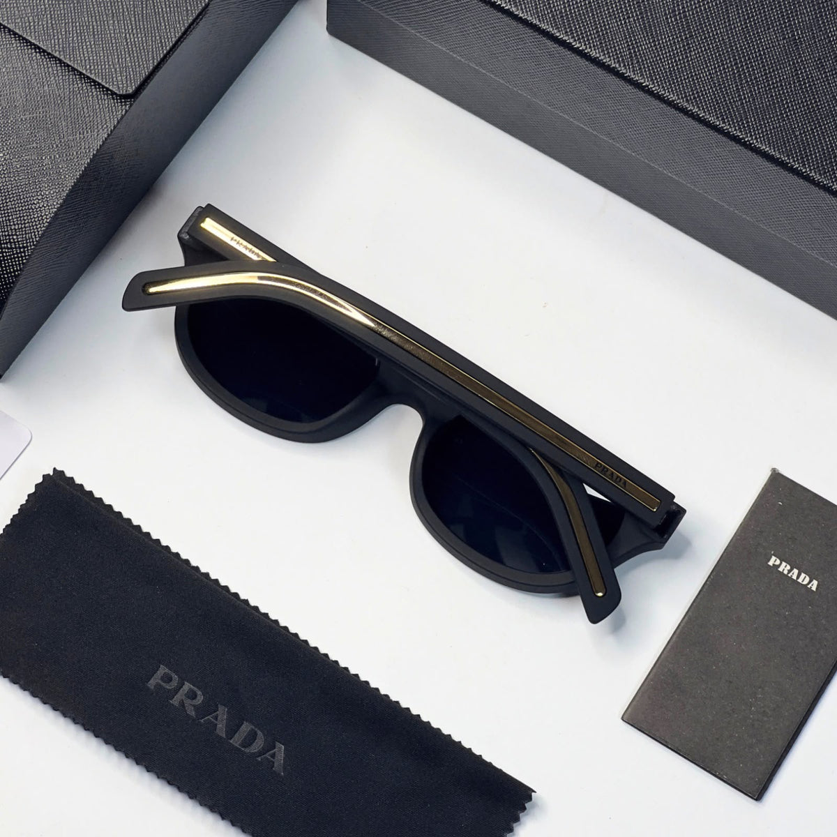 Pra_da matt black gold line sunglasses