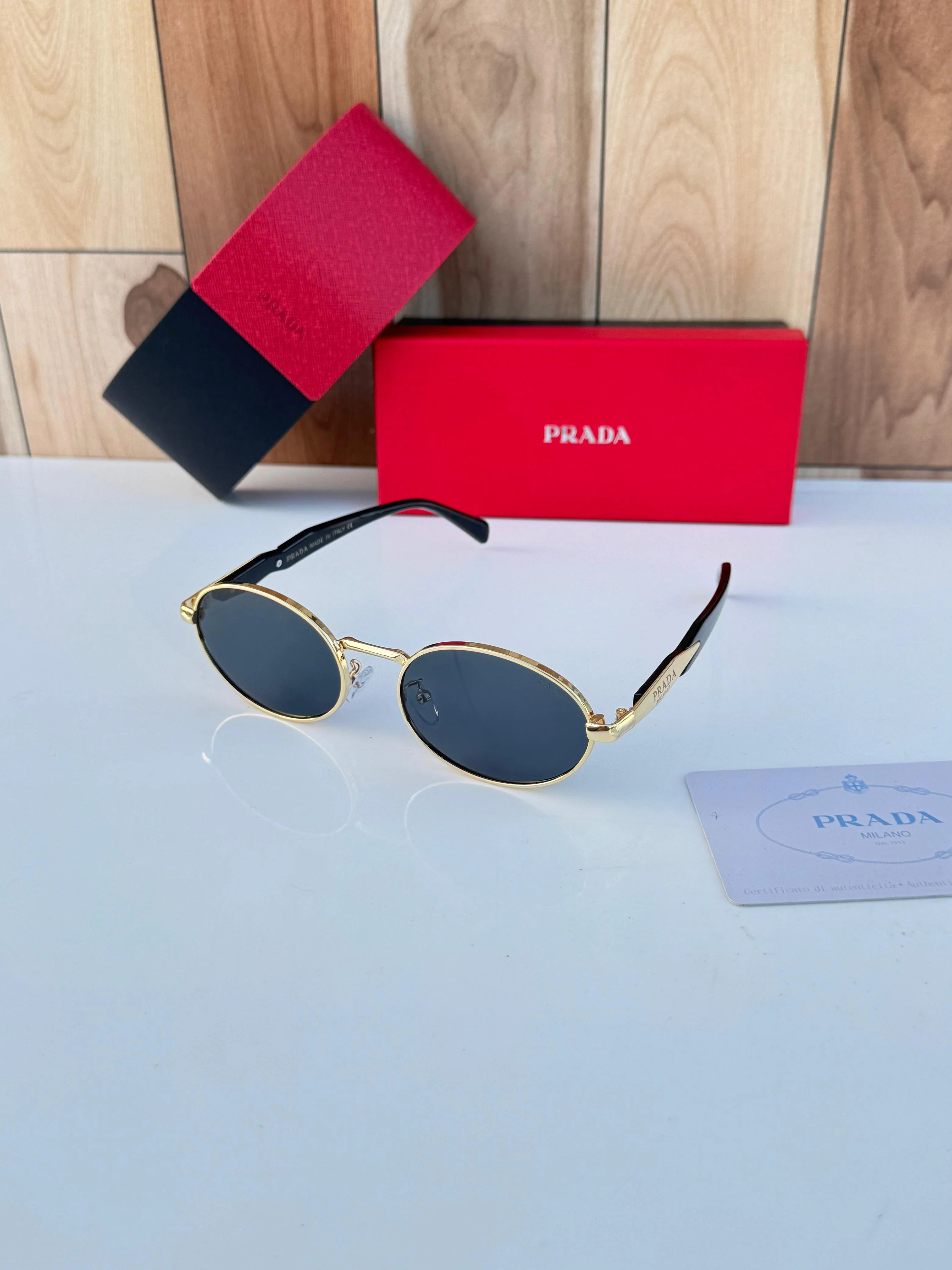 Prada 8007 gold black SUNGLASS