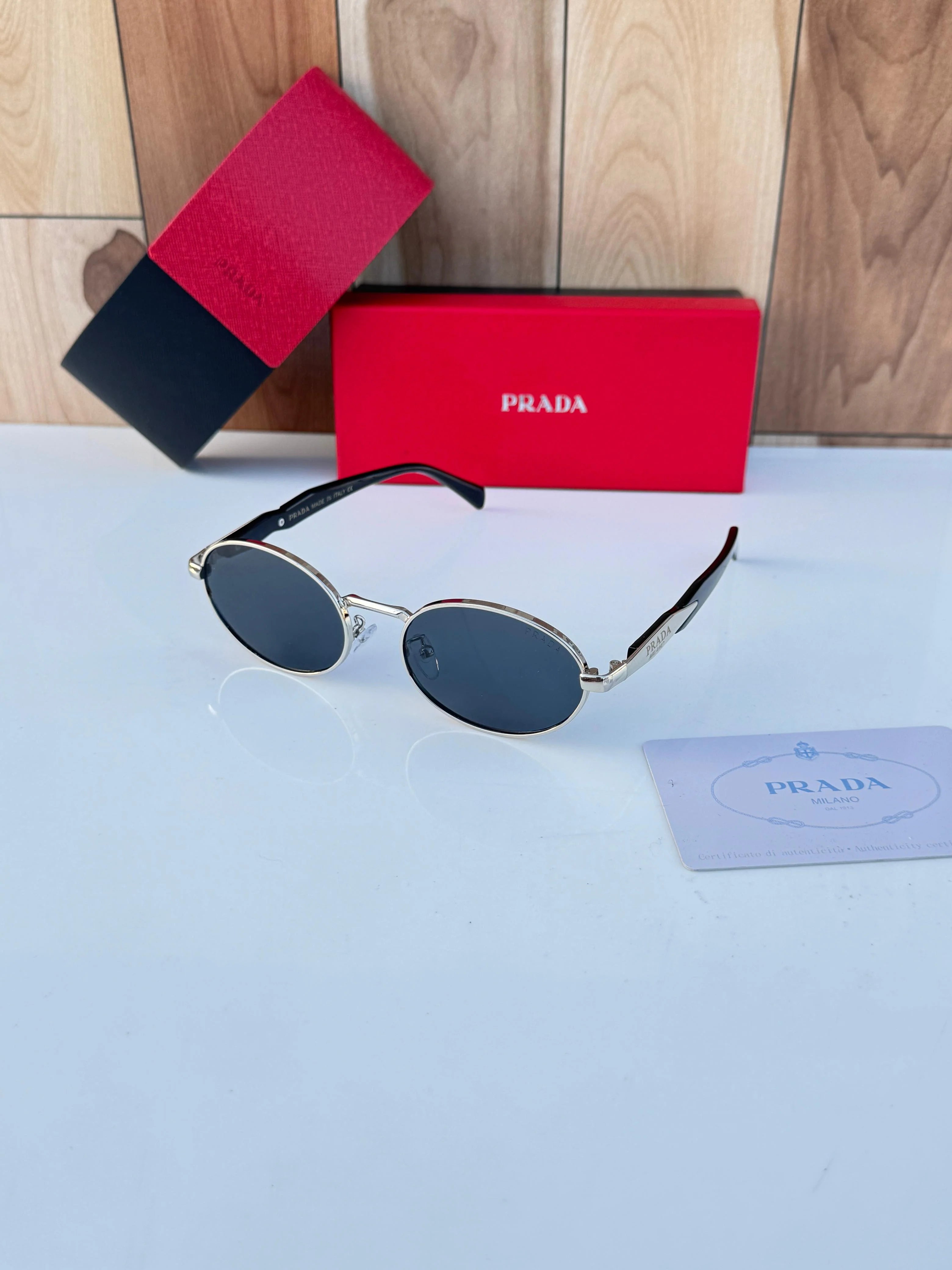 Prada 8007 gold black SUNGLASS