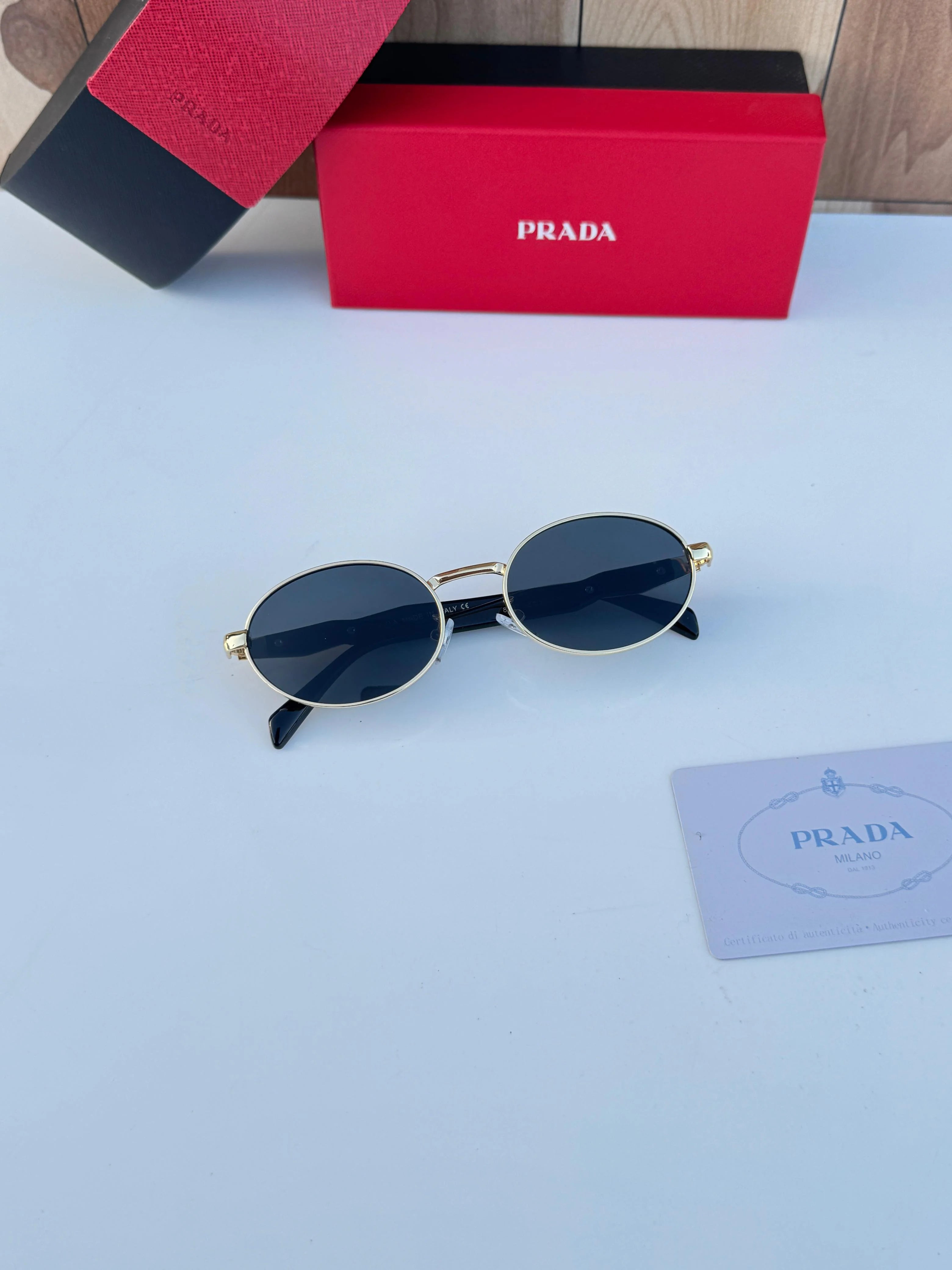 Prada 8007 gold black SUNGLASS